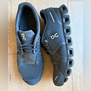 On Running Men's Black Athletic Shoes in very good condition.